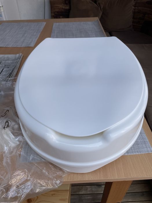 Повдигаща седалка за тоалетна чиния