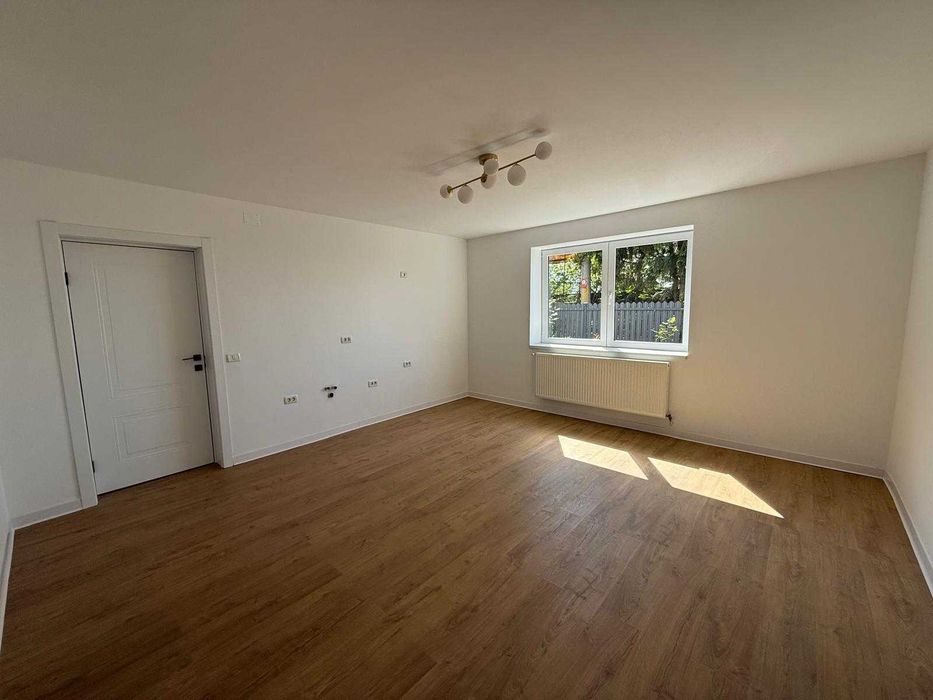 Apartament în casă cu curte terasata si garaj – la 5 minute de Centru