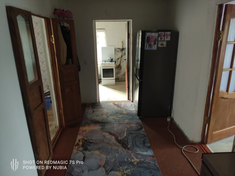 Дом находится за 7 школой