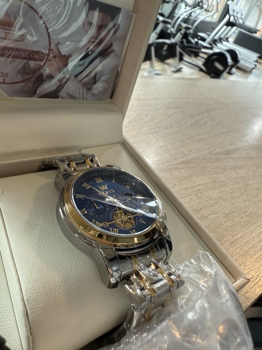 Часовник OLEVS.