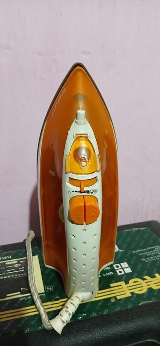 Утюг в рабочем состояний