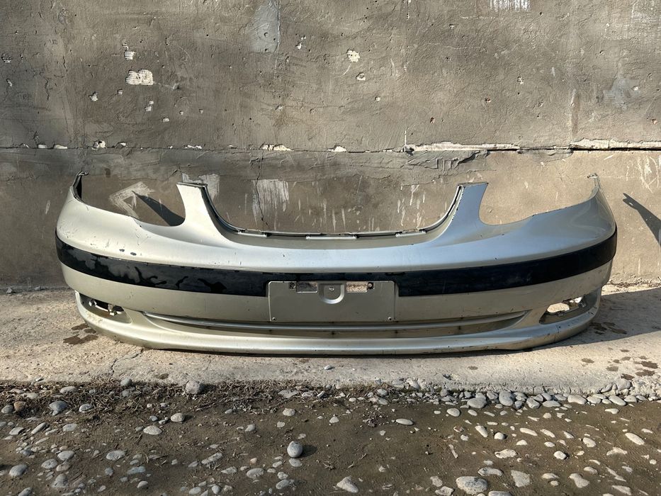 Toyota Corolla E120 Бампер передняя