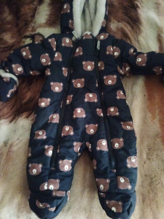 Vând compinezon 6-12