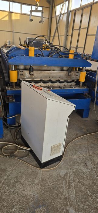 Профнастил Черпитца станоклар ва кран оек рулон иладиган.