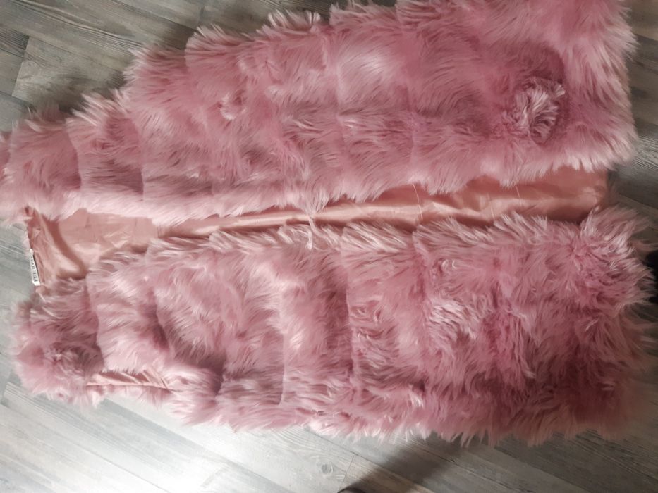 Пухен елек      .