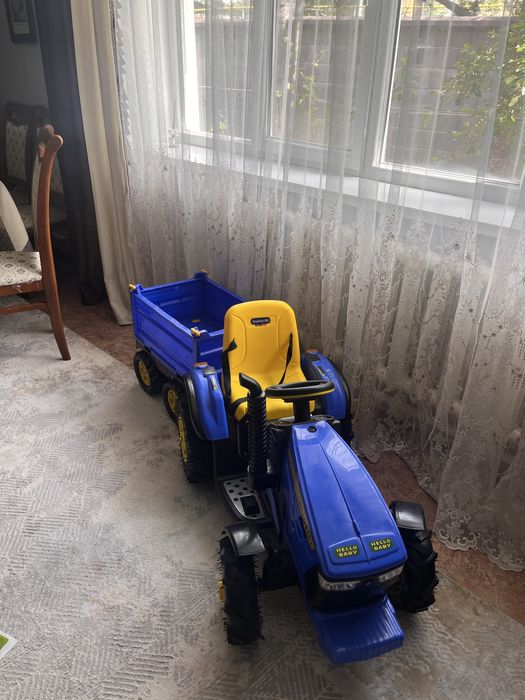 Продам синий трактор