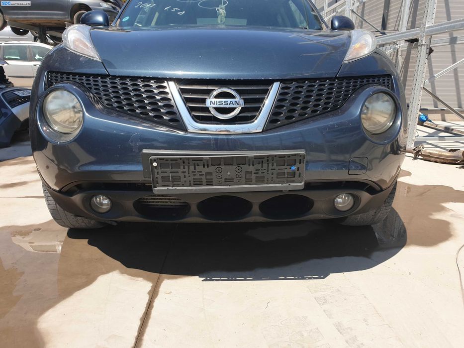 Bara Spoiler Fata cu Proiectoare FARA Grila cu Emblema Nissan Juke F15 NFL Non Facelift 2010 - 2014 Culoare RAQ [K6302]