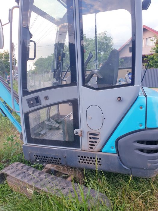 Vând miniexcavator în stare foarte buna