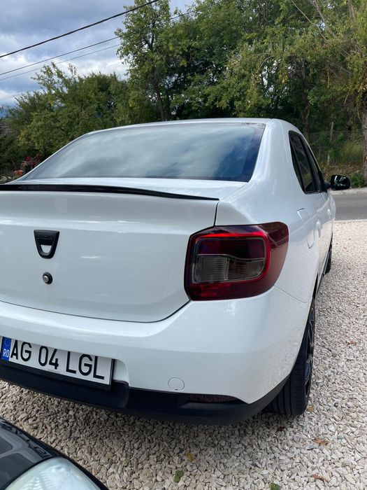 Vând DACIA Logan .