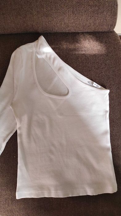 Женская кофточка в новом состоянии