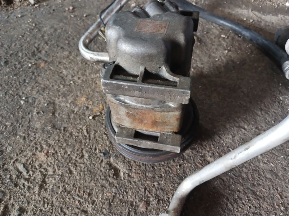 Компрессор кондиционера Мазда 323