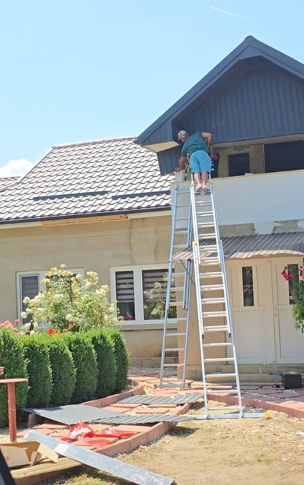 Montaj acoperis tigla metalica si ceramica reparatii de urgență etca