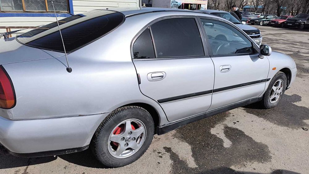 Мутсубиши карисма