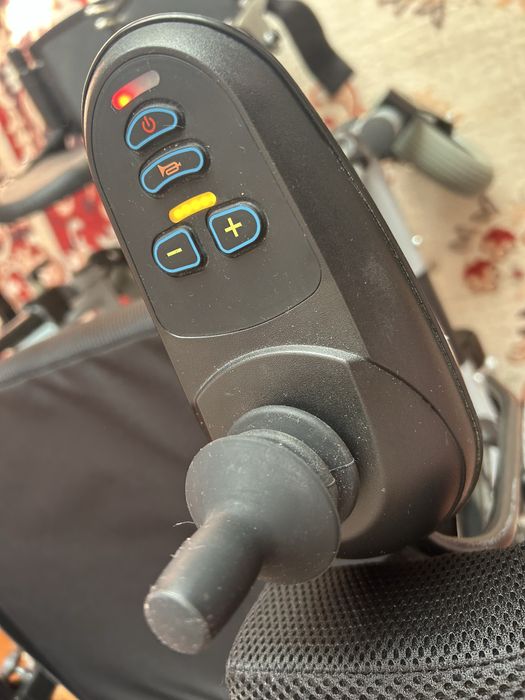 Электрическая  инвалидная коляска