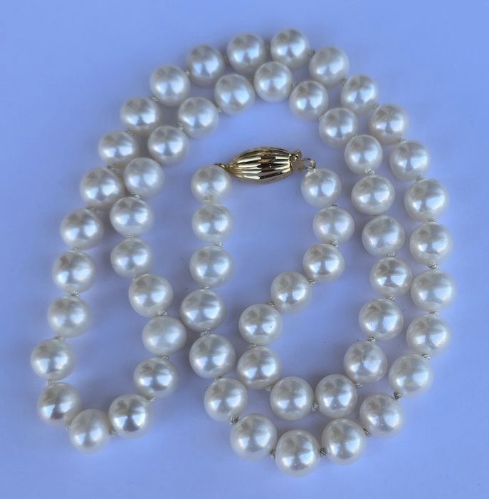Colier de perle de cultura cu aur galben 18k