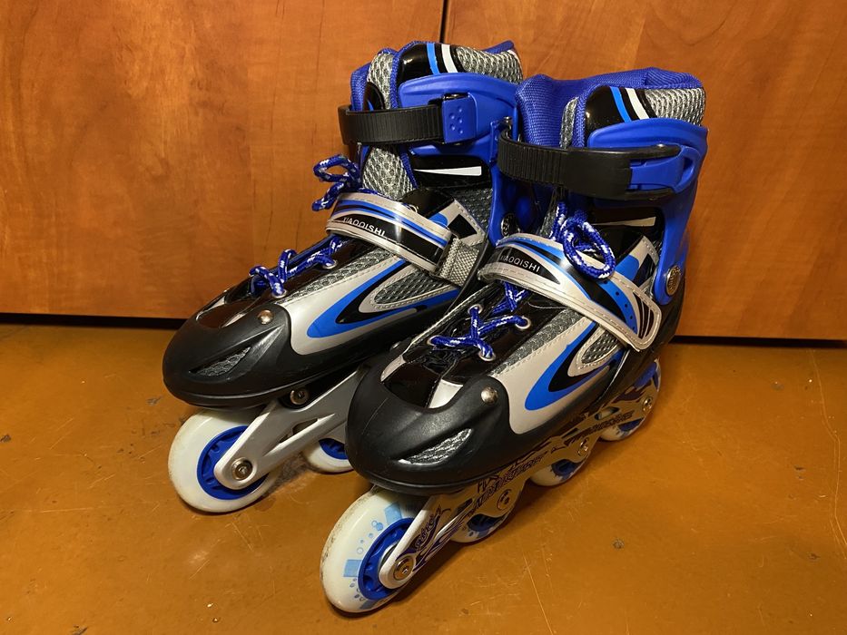 Роликовые коньки