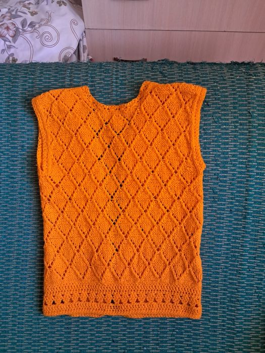 Жилетка связана руками