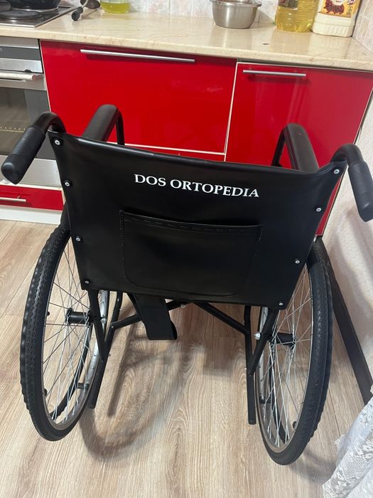 Коляска для инвалидни