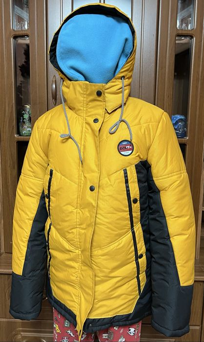 Куртки,пальто.