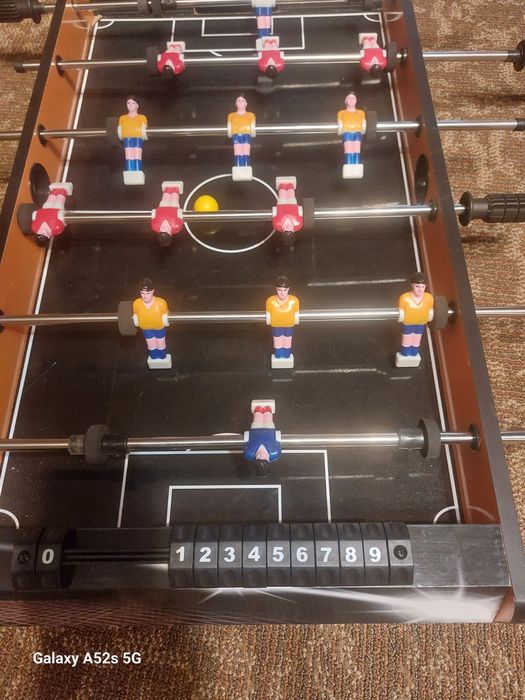 Joc de fotbal ,masa fotbal