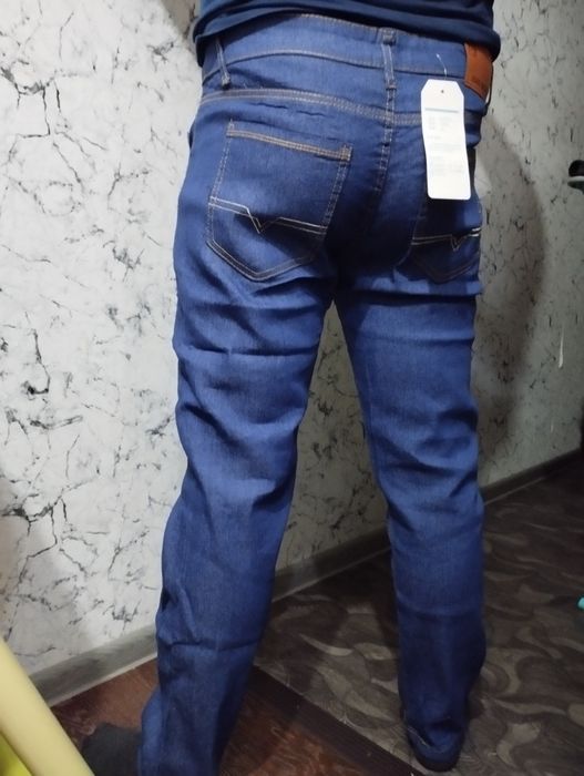 Продам мужские джинсы