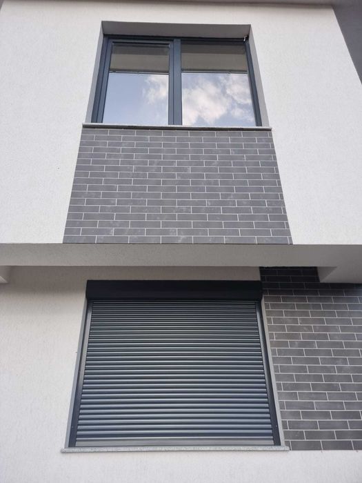 Usi de garaj sectionate rulouri exterioare, automatizari, bariere