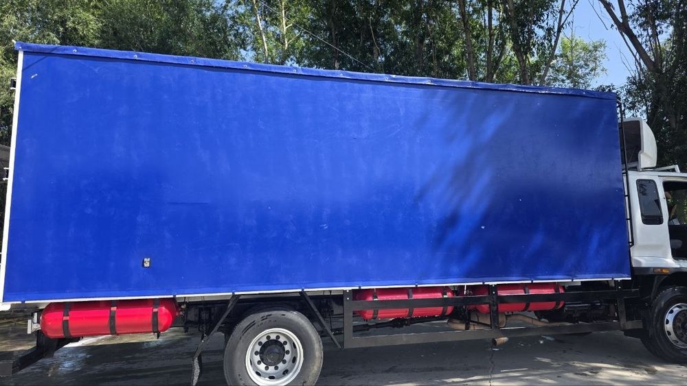 Isuzu Katta bort yuk tashuvchi (10 tonnali)