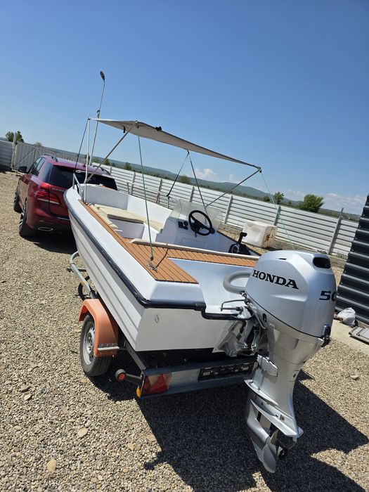 Ansamblu barca cu motor Honda  si peridoc