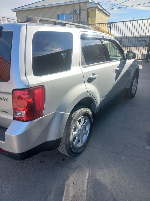 Продам Mazda tribute