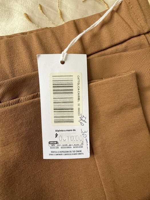 Брюки пройзводство Италия