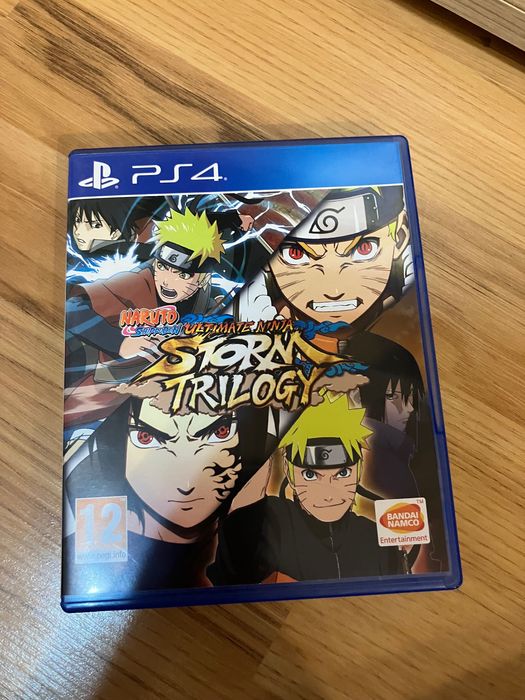 Плейстейшън 4 слим с 2 контролера и 9 игри