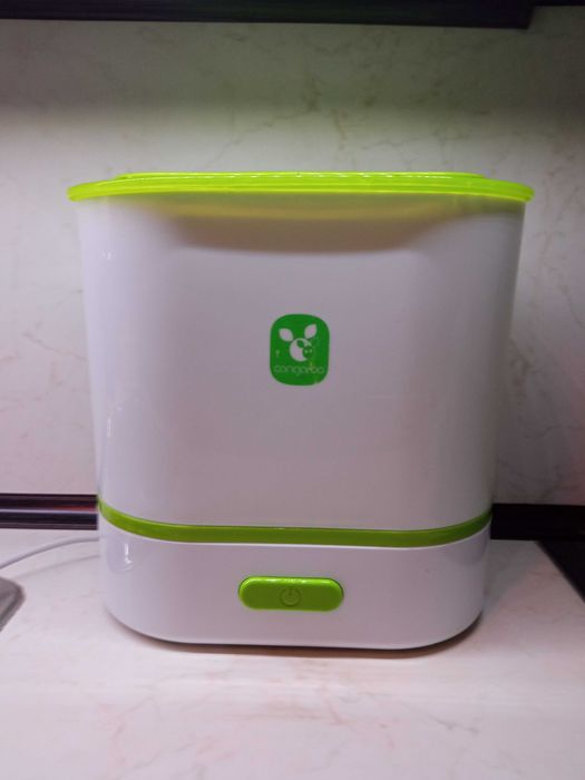 Стерилизатор за бебешки шишета и приготвяне на храна на пара