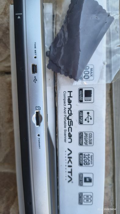 Scanner portabil Akita