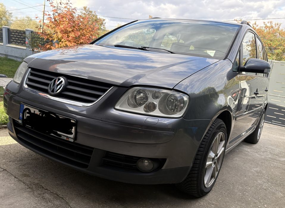Vând vw touran DSG