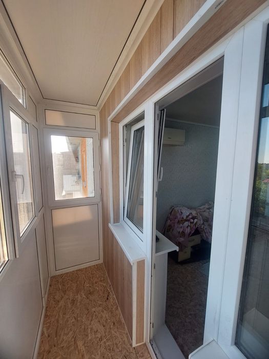 Пластиковые окна двери балконы