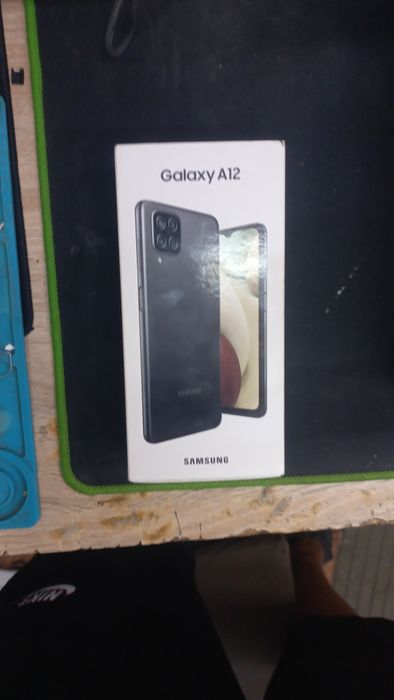 Самсунг а 12     64 гб
