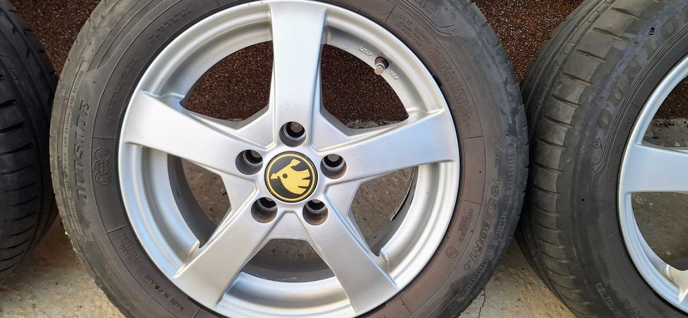 Jante aliaj Skoda Fabia2/Polo/Seat Ibiza 5x100-14"- 5½Jx14H2 +anvelope Dunlop Sport Bluresponse 185/60R14 82H DOT2024+21 Prezoane M14 F1,5 25MM CONICE