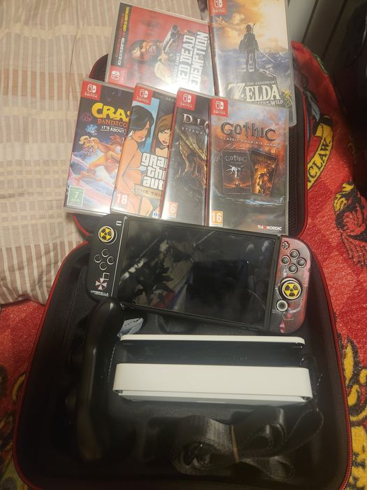 Продам nintendo switch oled с играми