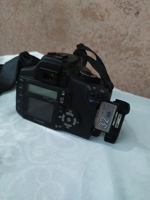 Foto aparat qoʻshimcha Binokili bilan