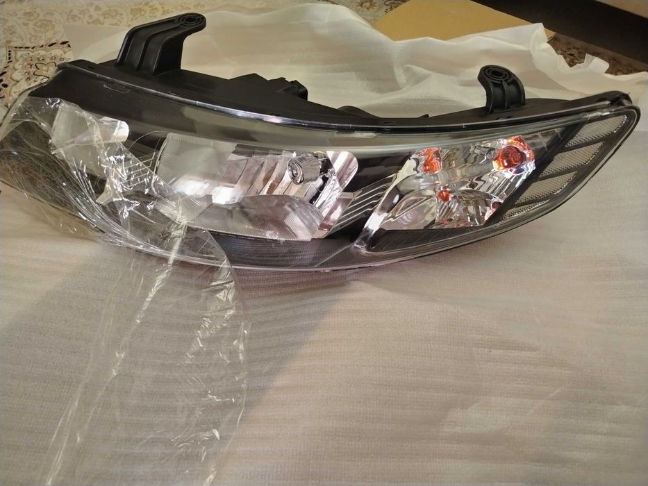 Фара kia cerato (левая сторона)