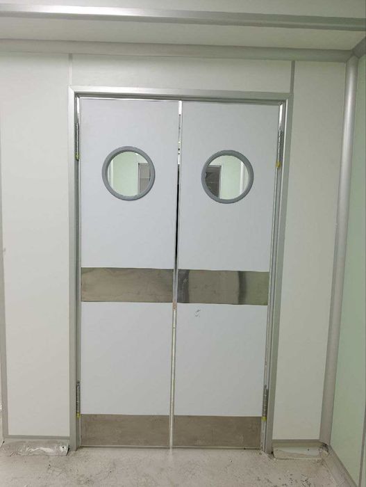 Двери маятниковые