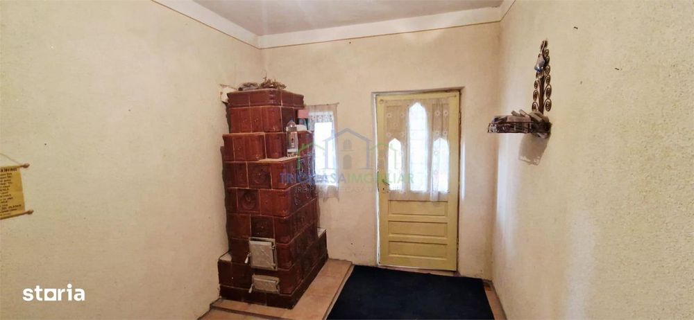 Casa Bradesti , teren  intravilan 7952 mp , deschidere 33 m la DE 70