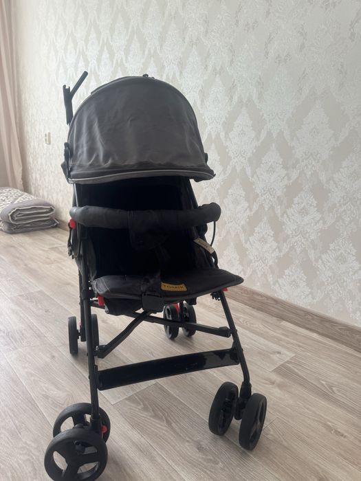 Прогулочная коляска фирмы Tomix