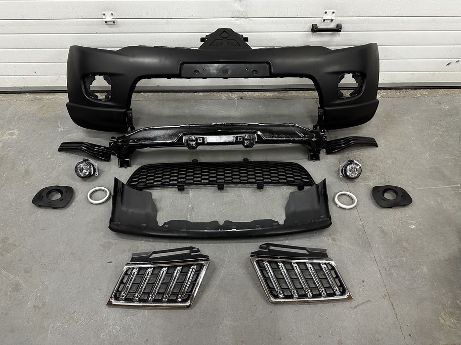 Бампер передний Паджеро Спорт