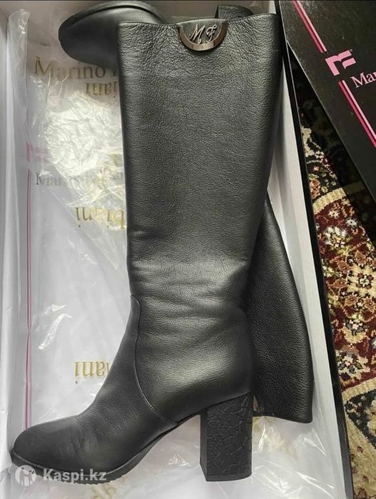 Продам сапоги новые