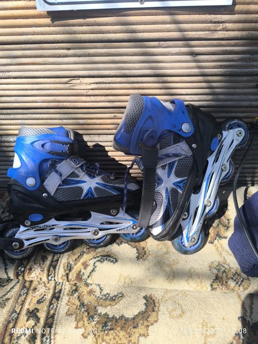 Роликовые коньки