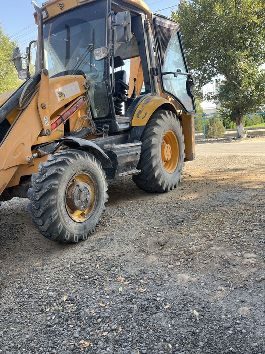 Услуги трактора JCB 3CX в Таразе