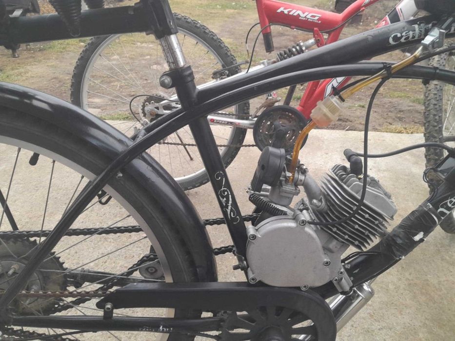 Vand bicicleta cu motor 89cc