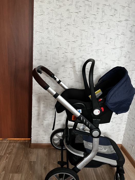 Коляска с автолюлкой