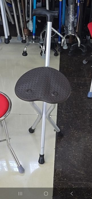 трость стула  фонариk. Alyuminiviy hassali yigʻma stul ruchkasida fona